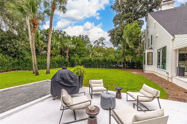 view of patio / terrace featuring an outdoor hangout area and a grill