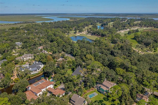 birds eye view of property with a water view