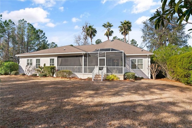 view of front of home featuring a lanai