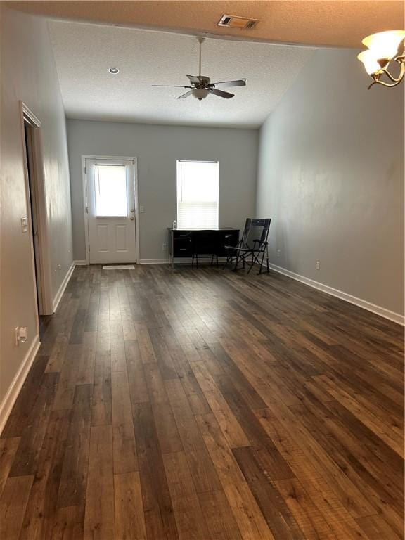366 Moss Creek Ln, Brunswick, GA 31520 - foyer entrance with dark wood-style floors, a chandelier, and ceiling fan