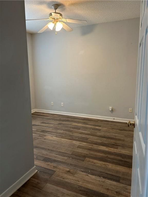 366 Moss Creek Ln, Brunswick, GA 31520 - unfurnished room featuring a ceiling fan, dark wood-style floors, and a textured ceiling