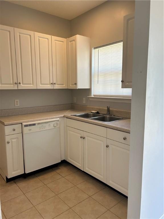 366 Moss Creek Ln, Brunswick, GA 31520 - kitchen featuring dishwasher, white cabinetry, light tile patterned floors, and light countertops