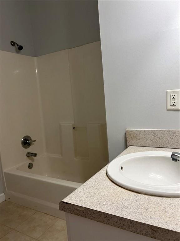 366 Moss Creek Ln, Brunswick, GA 31520 - full bath with vanity, tile patterned floors, and washtub / shower combination