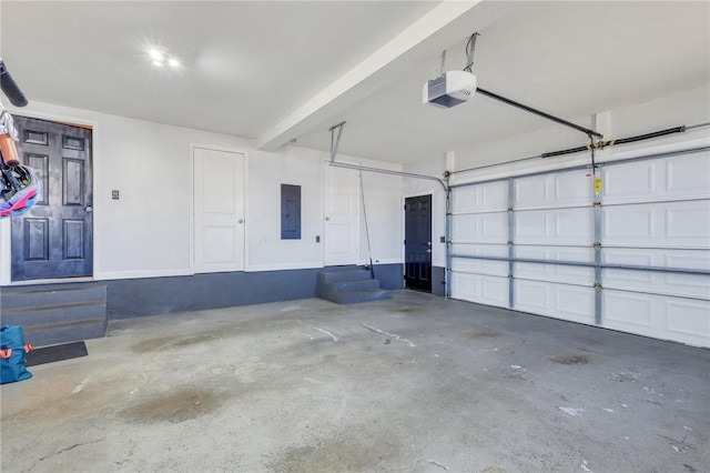 garage with electric panel and a garage door opener