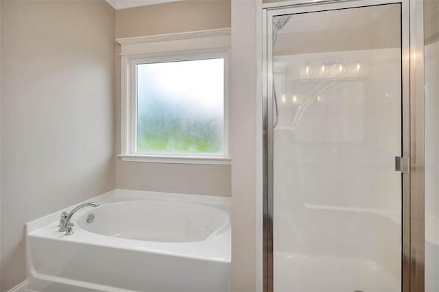 94 Silver Bluff Dr, Brunswick, GA 31523 - full bath with plenty of natural light, a shower stall, and a bath