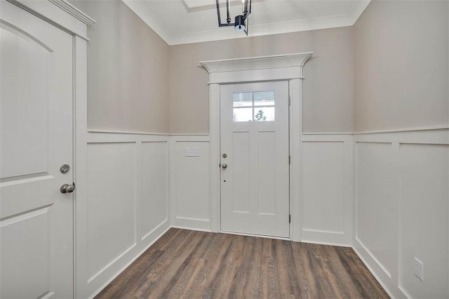 94 Silver Bluff Dr, Brunswick, GA 31523 - entrance foyer with a decorative wall, dark wood-style flooring, a wainscoted wall, and ornamental molding