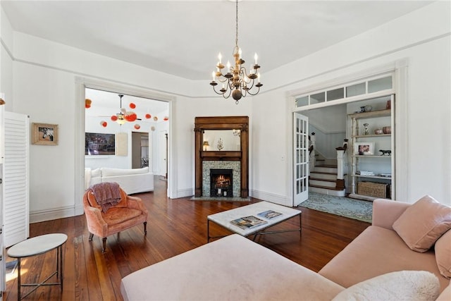 living room with dark hardwood / wood-style flooring