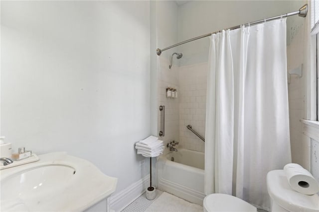 bathroom with toilet and shower / tub combo