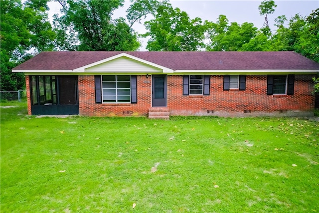2867 Evergreen Rd, Waycross, GA 31501 - single story home with crawl space, entry steps, a front yard, a sunroom, and brick siding