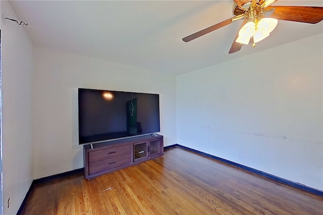 2867 Evergreen Rd, Waycross, GA 31501 - unfurnished living room featuring light wood-style flooring and a ceiling fan