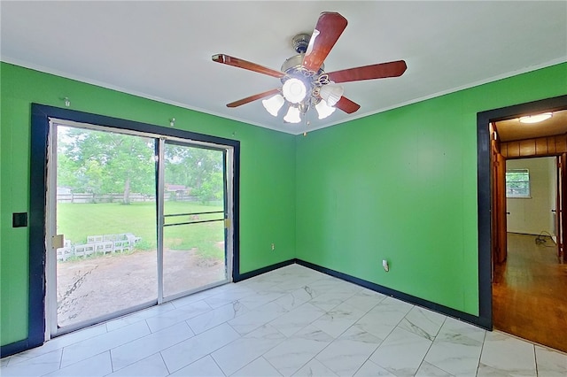2867 Evergreen Rd, Waycross, GA 31501 - spare room with ornamental molding, ceiling fan, and light marble finish floors