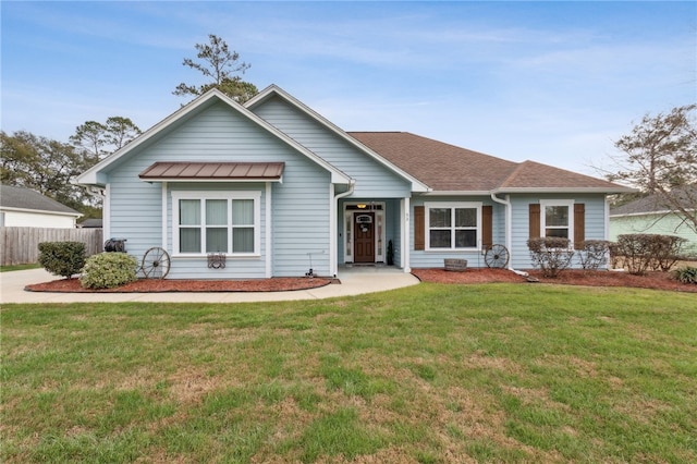 view of front facade with a front lawn