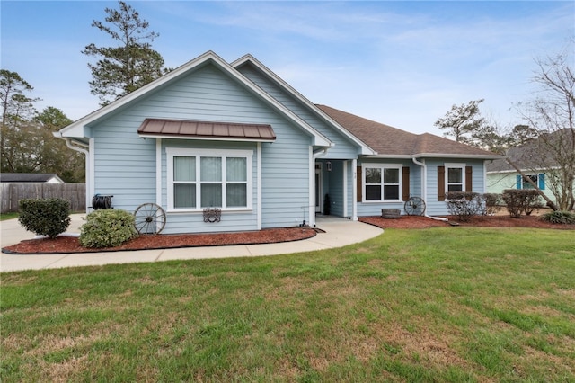 view of front of home with a front yard