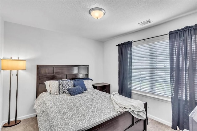 592 Brightleaf Cir, Hinesville, GA 31313 - bedroom featuring carpet floors, baseboards, and a textured ceiling
