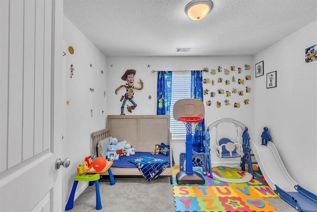592 Brightleaf Cir, Hinesville, GA 31313 - carpeted bedroom with a textured ceiling