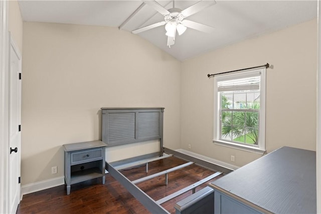 bedroom with dark wood-type flooring, ceiling fan, and lofted ceiling