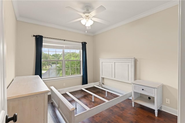 bedroom with ceiling fan, dark hardwood / wood-style flooring, and crown molding