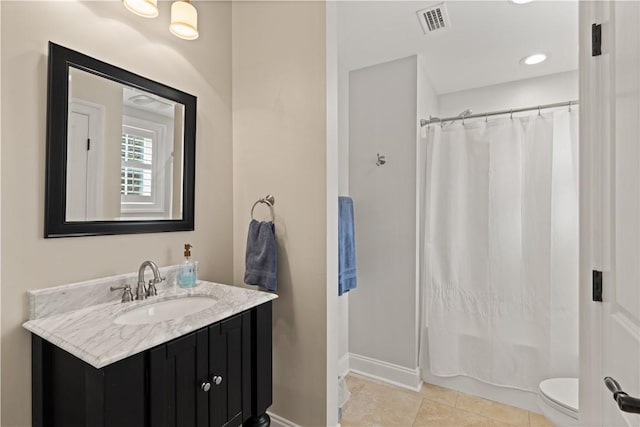 full bathroom with shower / bathtub combination with curtain, vanity, toilet, and tile patterned flooring