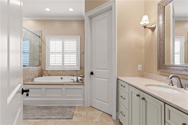 bathroom with vanity, separate shower and tub, and tile patterned floors