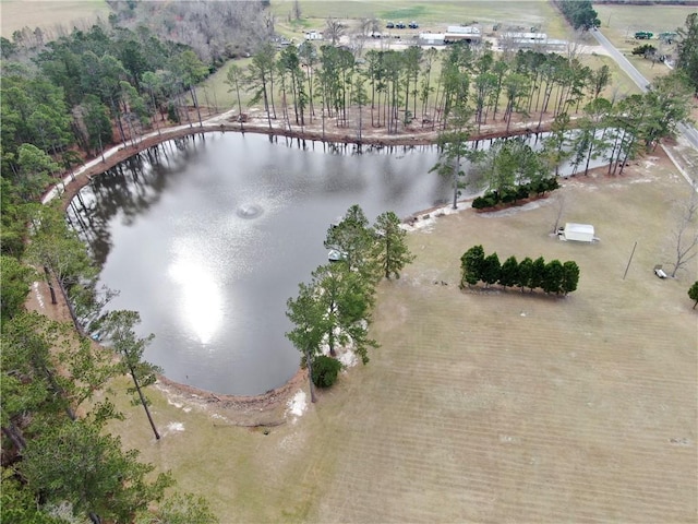 aerial view with a rural view and a water view