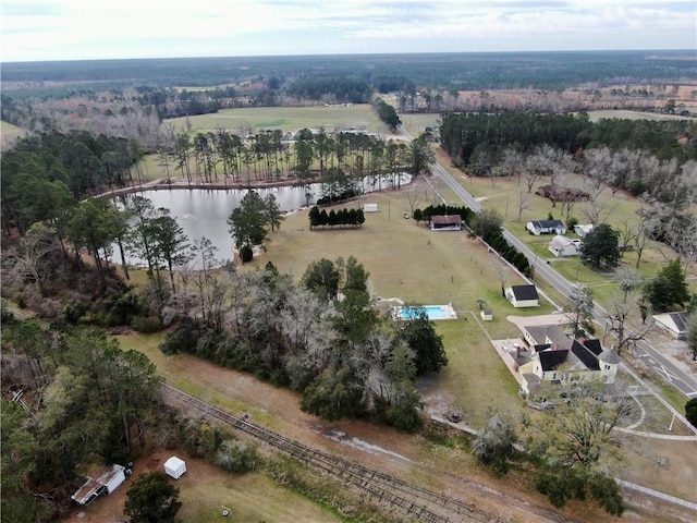 drone / aerial view featuring a rural view and a water view