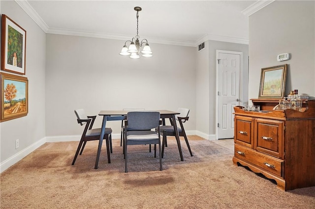 dining area with light carpet, a chandelier, ornamental molding, and baseboards