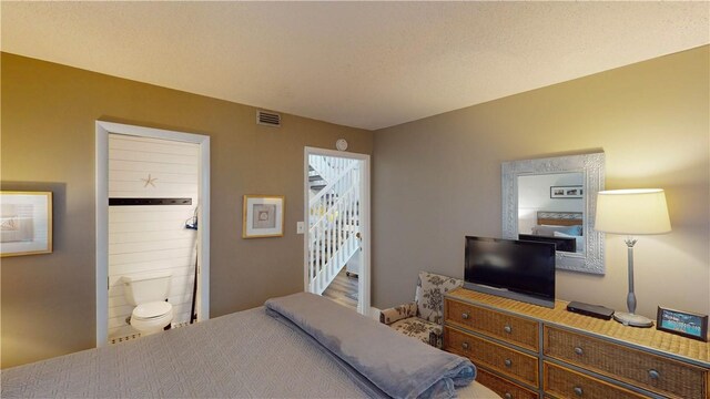 bedroom with visible vents