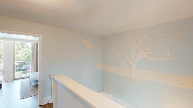 1175 N Beachview Dr Unit 337, Jekyll Island, GA 31527 - hall featuring wood finished floors and an upstairs landing