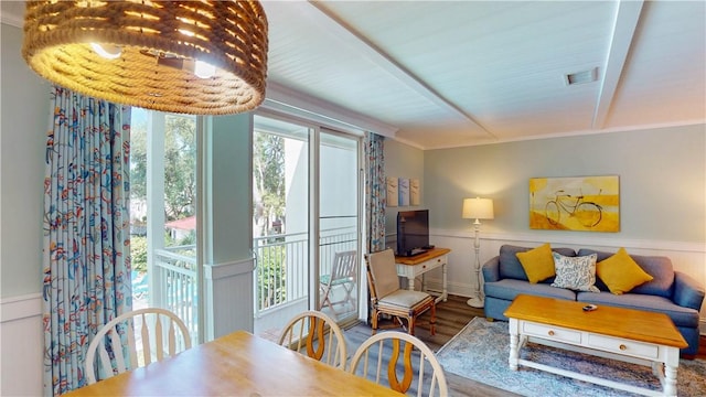 1175 N Beachview Dr Unit 337, Jekyll Island, GA 31527 - dining area featuring wainscoting, wood finished floors, and visible vents