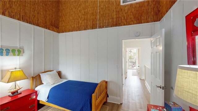 bedroom featuring wood finished floors