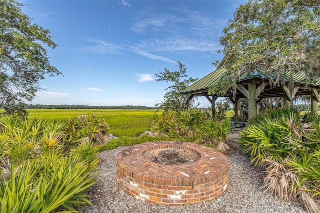 view of patio / terrace featuring a gazebo and a rural view