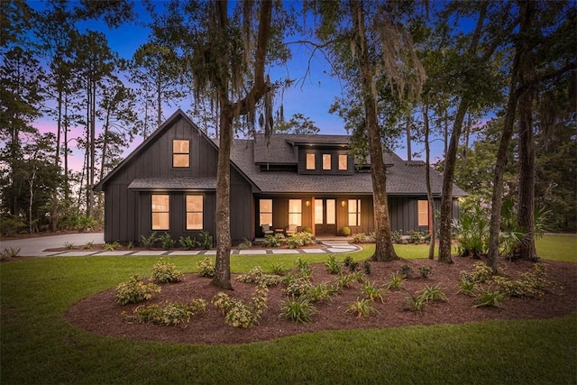 view of front of home with a yard