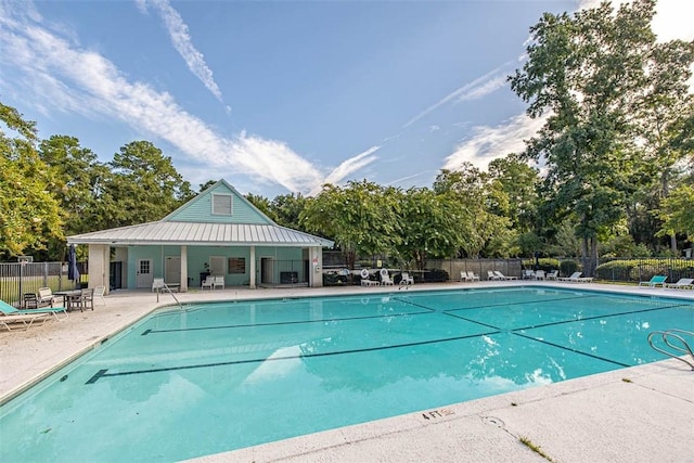 view of pool featuring a patio