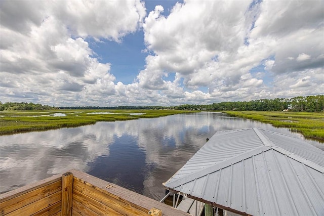 dock area featuring a water view