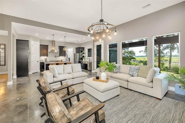 living room with a chandelier