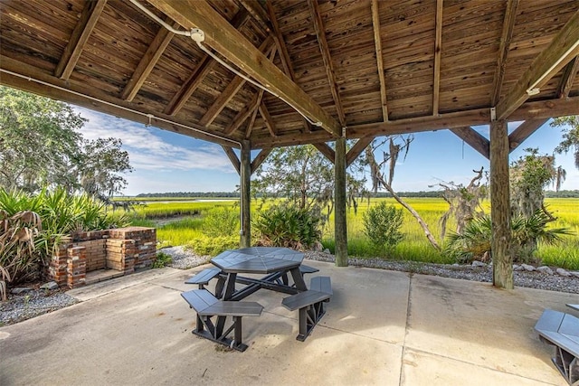 view of patio with a gazebo and a rural view