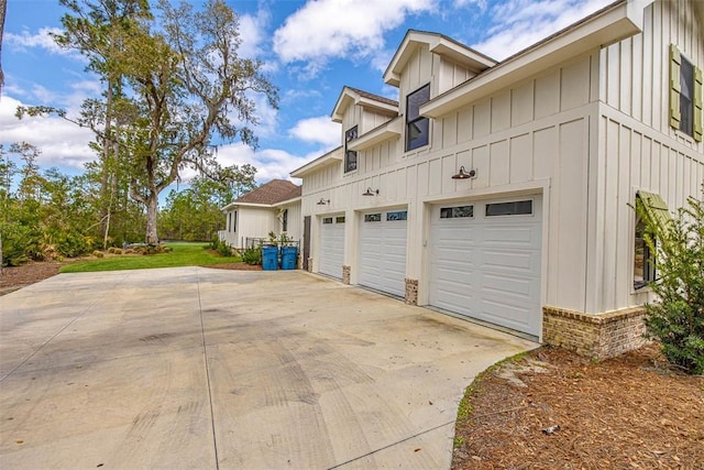 view of side of home with a garage