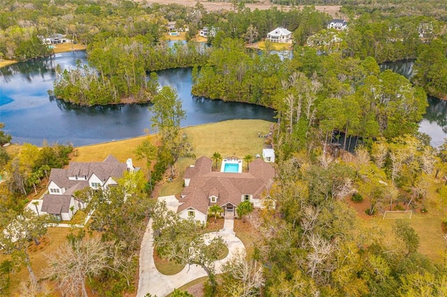 drone / aerial view with a water view