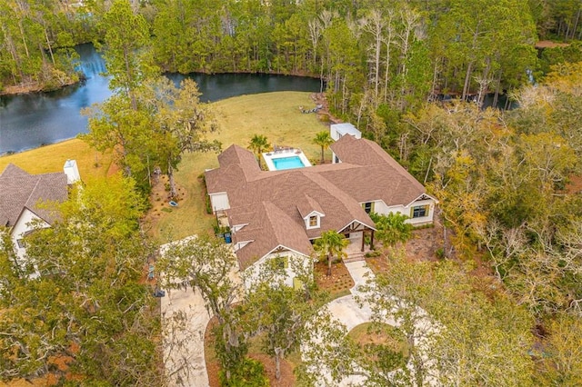 birds eye view of property featuring a water view