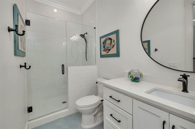 bathroom featuring crown molding, vanity, a shower with shower door, and toilet