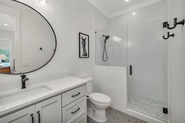 bathroom with vanity, toilet, an enclosed shower, and crown molding