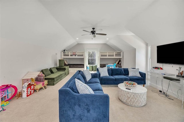 carpeted living room featuring vaulted ceiling and ceiling fan