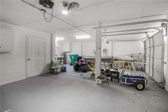 garage featuring a garage door opener