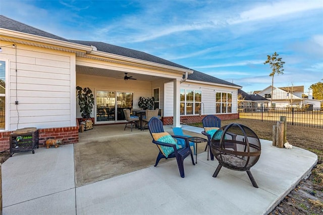 view of patio featuring ceiling fan