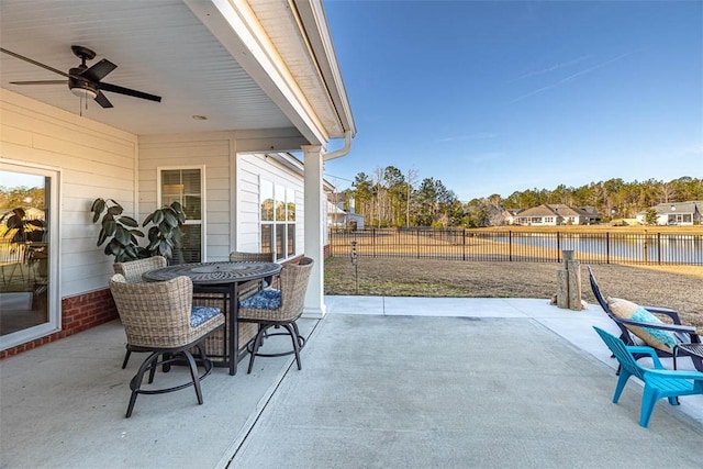 view of patio featuring ceiling fan