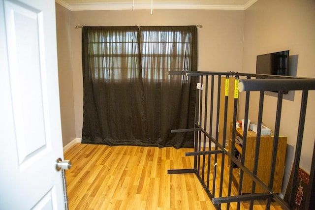 320 Brobston St, Baxley, GA 31513 - stairway featuring wood finished floors and crown molding