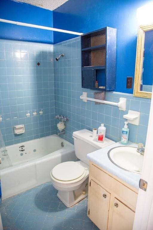 320 Brobston St, Baxley, GA 31513 - full bathroom with shower / bathtub combination, vanity, and tile walls