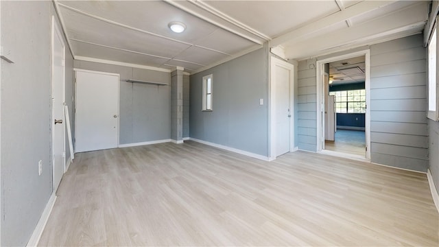 1301 Riverside Ave, Waycross, GA 31501 - unfurnished bedroom with wood finished floors, a closet, and baseboards