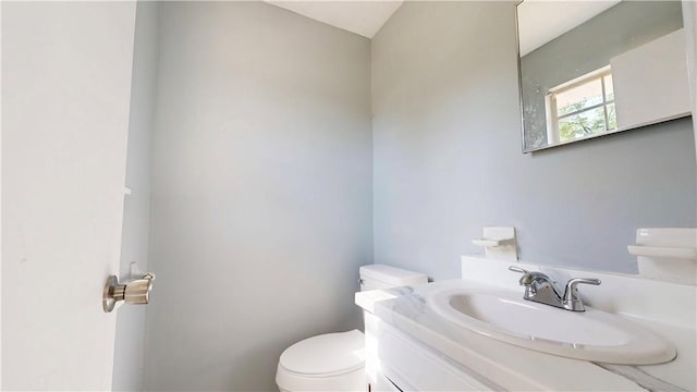1301 Riverside Ave, Waycross, GA 31501 - bathroom with toilet and vanity