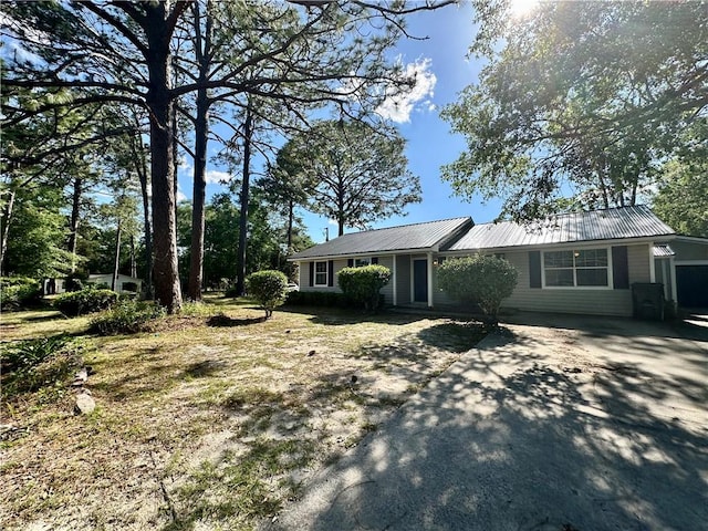 1301 Riverside Ave, Waycross, GA 31501 - single story home featuring metal roof and driveway